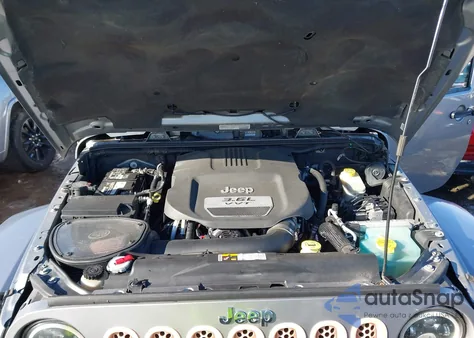 2013 Jeep Wrangler Unlimited Sahara из США, поврежденный, VIN 1C4BJWEG3DL627424